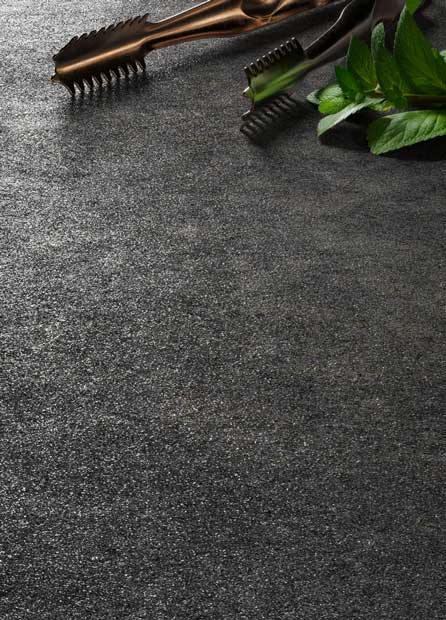 Leather metal on Caesarstone Porcelain 232 Cider surface