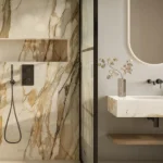 Caesarstone Porcelain 536 Antikella in Luxurious marble bathroom with walk-in shower, rain showerhead, recessed shelf, illuminated mirror, and sleek vanity.